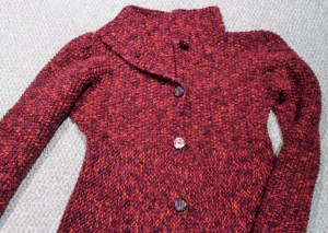 Four inch collar picked up at neck edge; fitted waistline. 