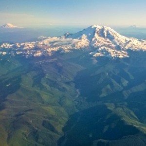 Volcanos of Washington State taken from the window of the airplane