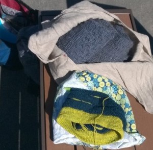 Two projects--taking up a whole bench at Kenmore Air Harbor